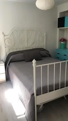 Cama o camas de una habitación en Apartamento 1 dormitorio y salon con sofa cama bien comunicado con el centro