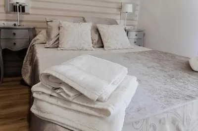 Cama o camas de una habitación en El Almezo
