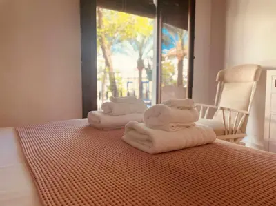 Cama o camas de una habitación en Apartamento Céntrico Corredera