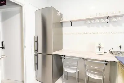 Una cocina o zona de cocina en Guesthouse Room & Studio Seville La Flamenka
