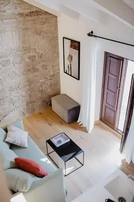 Zona de estar de La Ermita Suites - Único Hotel Monumento de Córdoba