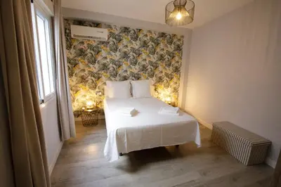 Cama o camas de una habitación en Ático Casa Lola