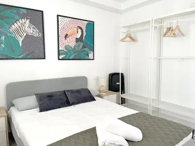 Cama o camas de una habitación en Mezquita Apartamento