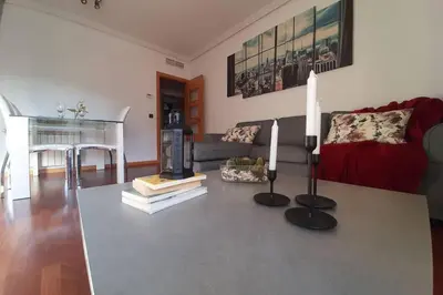 Zona de estar de Piso céntrico con piscina,parking y jacuzzi
