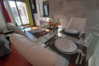 Zona de estar de Piso céntrico con piscina,parking y jacuzzi