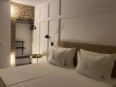 Cama o camas de una habitación en EL ZAGUÁN DE LA JUDERÍA