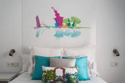 Cama o camas de una habitación en Pop Art, Un aroma a San Julián en Enladrillada