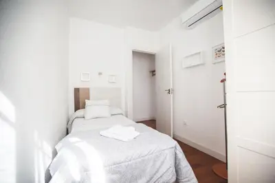 Cama o camas de una habitación en Apartamento PASEO DE LA RIBERA