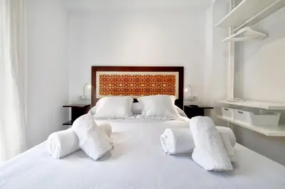 Cama o camas de una habitación en San Basilio, Parking Incluido Junto al Casco Histórico