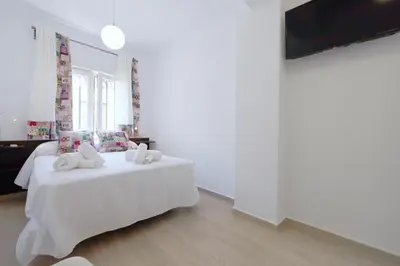 Cama o camas de una habitación en San Basilio, Parking Incluido Junto al Casco Histórico