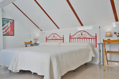 Cama o camas de una habitación en SunShine Villa