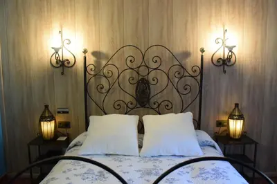 Cama o camas de una habitación en Hotel Sierra Madrona