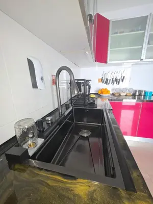 Una cocina o zona de cocina en Al-Bayassi