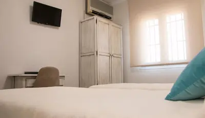 Cama o camas de una habitación en Hostal Restaurante el Cary