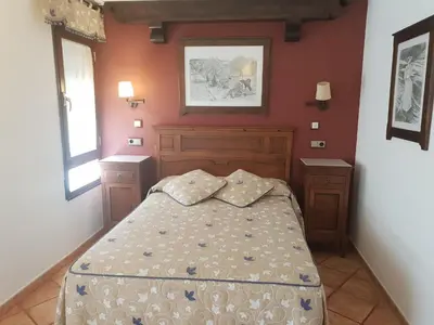 Cama o camas de una habitación en Pensión Ana Pilar