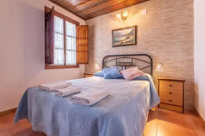 Cama o camas de una habitación en Casa Pepita