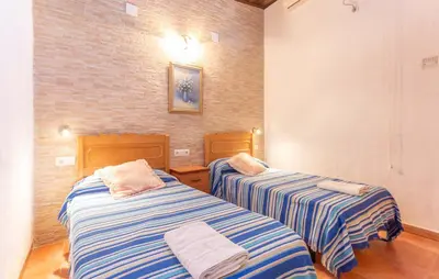 Cama o camas de una habitación en Casa Pepita