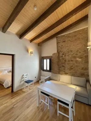 Cama o camas de una habitación en APARTAMENTOS RURALES POSADA DE LLERENA