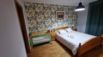 Cama o camas de una habitación en Paseo de la Ribera. Córdoba.