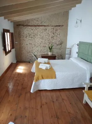 Cama o camas de una habitación en La Casita de Papel Alhama de Granada