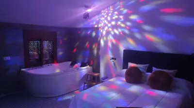 Cama o camas de una habitación en El nido de la Jabonería