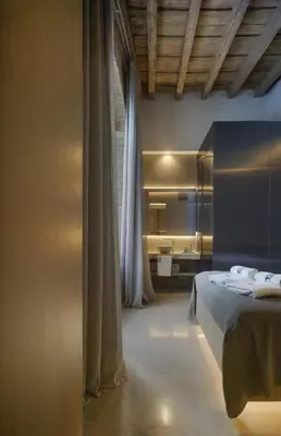 Cama o camas de una habitación en Apartamentos Los Patios del Pañuelo