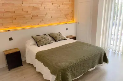 Cama o camas de una habitación en Sevilla Torneo PG Apartamentos