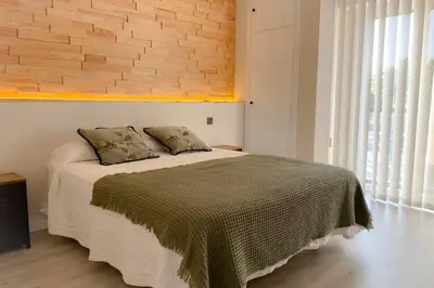 Cama o camas de una habitación en Sevilla Torneo PG Apartamentos