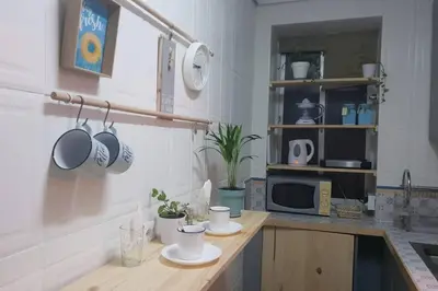 Una cocina o zona de cocina en Bonito y coqueto apartamento
