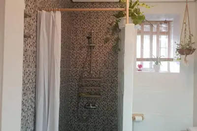 Un baño de Bonito y coqueto apartamento