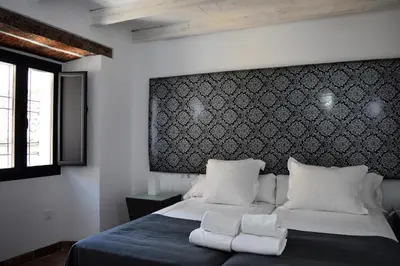 Cama o camas de una habitación en Patio San Andrés -2 llaves-
