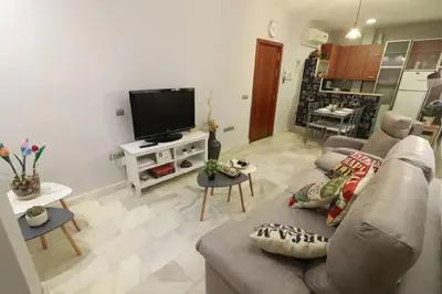 Una televisión o centro de entretenimiento en Apartamento Cristo de Burgos - Kainga Homes