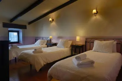 Cama o camas de una habitación en Casa rural La Rosa de Llerena