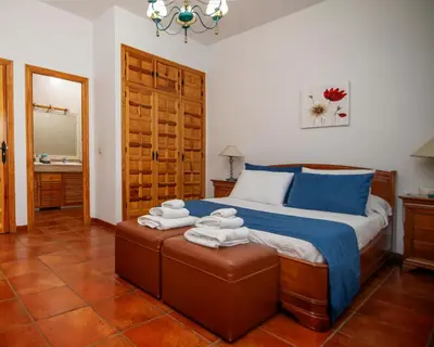 Cama o camas de una habitación en Villa Fuji Sierra de la Pandera Jaén