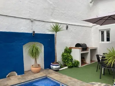 Un patio o zona al aire libre en Traditional Village House with Private Pool in Villanueva de San Juan