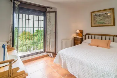 Cama o camas de una habitación en Cortijo Don Simón