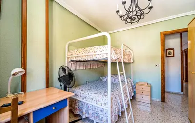 Cama o camas de una habitación en 3 Bedroom Cozy Apartment In Pegalajar