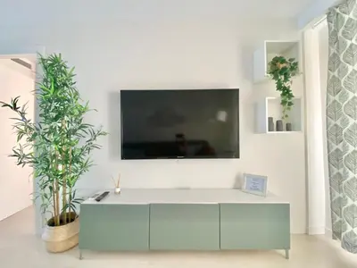 Una televisión o centro de entretenimiento en Apartamento Andalucía Centro