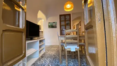 Una televisión o centro de entretenimiento en Casa del Viajero
