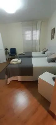 Cama o camas de una habitación en Sevilla Nervion Santa Justa