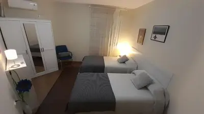 Cama o camas de una habitación en Sevilla Nervion Santa Justa