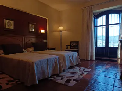 Cama o camas de una habitación en Hotel Escuela Convento Sto Domingo