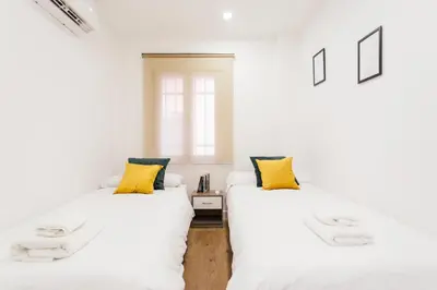 Cama o camas de una habitación en Alohamundi Puerta Osario