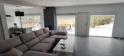 Zona de estar de Casa en el lago.unmillondeestrellas