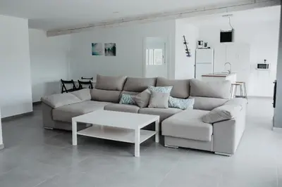 Zona de estar de Casa en el lago.unmillondeestrellas