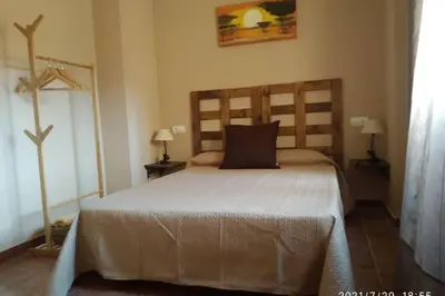 Cama o camas de una habitación en Casa rural Los Alcaidejos con piscina