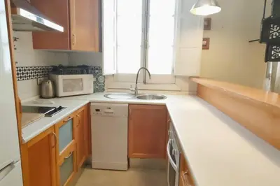 Una cocina o zona de cocina en HomeySeville-Duplex con Terraza Santa Cruz 5 pax, Parking Optional