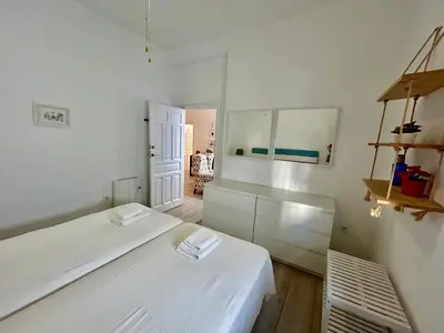 Cama o camas de una habitación en Acogedor apt 8pax 4Bdr 2Bth- CozyHomeSevilla2