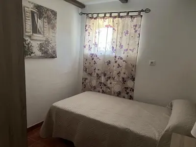 Cama o camas de una habitación en Alojamiento Rural Cortijo Alameda, Las Lagunillas