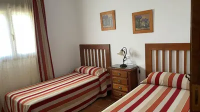 Cama o camas de una habitación en Casa Manolín